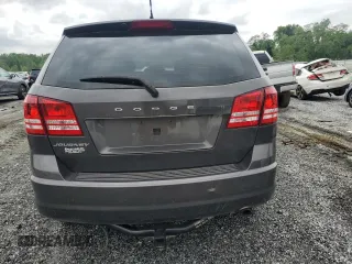 2015 Dodge Journey American Value z VIN 3C4PDCAB6FT649933, wystawiony jako Copart lot #54404415 z przebiegiem 144 830 mil mil oraz Szkoda całkowita • Salvage title. Historia ofert i sprzedaży dostępna na DreamBid. Obrazek 6.