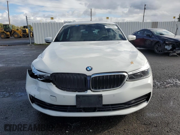 2019 BMW 6 Series 640i xDrive with VIN WBAJV6C52KBK08045, listed as a Copart auction lot 76004384 with 56,730 mi miles and Salvage Title. Bid and sale history available at carsss.com. Image 5.