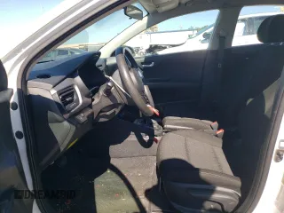 2023 Kia Rio S with VIN 3KPA24AD2PE579419, listed as a Copart auction lot 73399664 with 47,857 mi miles and Salvage Title. Bid and sale history available at DreamBid. Image 7.