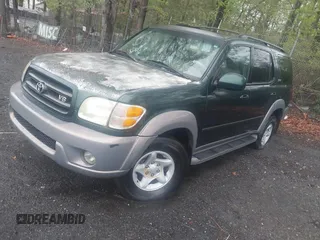 2002 Toyota Sequoia SR5 with VIN 5TDZT34A72S136628, listed as a IAAI auction lot 41978559 with 407,079 mi miles and . Bid and sale history available at DreamBid. Image 2.