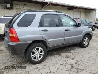 2005 Kia Sportage LX with VIN KNDJF723057062113, listed as a Copart auction lot 66630164 with 129,715 mi miles and Salvage Title. Bid and sale history available at carsss.com. Image 3.