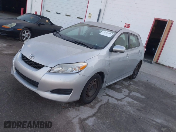 2009 Toyota Matrix with VIN 2T1KU40E59C106253, listed as a IAAI auction lot 41974823 with 126,155 mi miles. Bid and sale history available at carsss.com. Image 2.