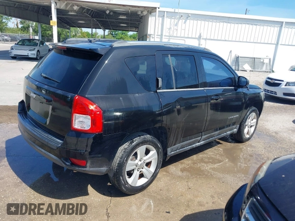 2013 Jeep Compass Sport with VIN 1C4NJCBB5DD103013, listed as a IAAI auction lot 41885936 with 169,402 mi miles. Bid and sale history available at carsss.com. Image 4.