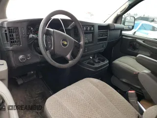 2012 Chevrolet Express Passenger 1LT with VIN 1GAZGYFG8C1174282, listed as a Copart auction lot 86012024 with 170,680 mi miles and Salvage title. Bid and sale history available at DreamBid. Image 8.