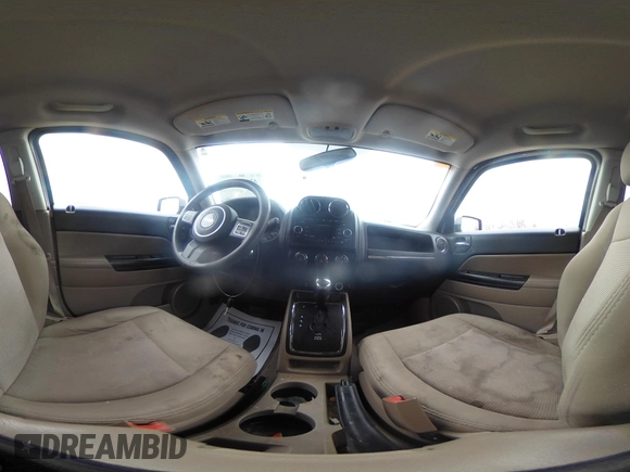 2014 Jeep Patriot Sport with VIN 1C4NJRBB1ED744101, listed as a IAAI auction lot 42009390 with 180,214 mi miles. Bid and sale history available at carsss.com. Image 20.