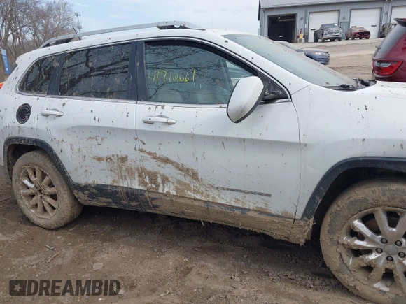 2015 Jeep Cherokee Limited with VIN 1C4PJMDB7FW584076, listed as a IAAI auction lot 41712661 with 183,000 mi miles and . Bid and sale history available at DreamBid. Image 13.