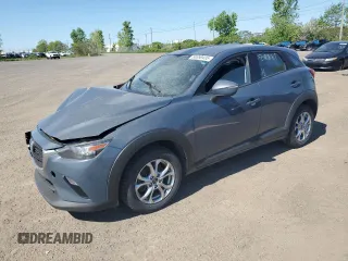 2021 Mazda CX-3 Touring z VIN JM1DKFC71M1511904, wystawiony jako Copart lot #58350435 z przebiegiem 100 071 mil mil oraz Szkoda całkowita • Salvage title. Historia ofert i sprzedaży dostępna na DreamBid. Obrazek 1.