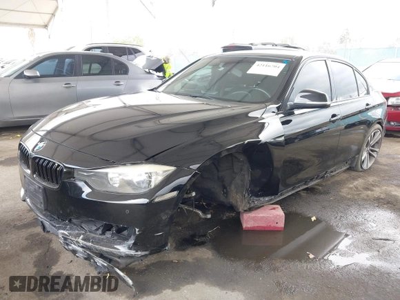 2014 BMW 3 Series 328i with VIN WBA3C1G53ENR49917, listed as a IAAI auction lot 42116704 with 148,630 mi miles and . Bid and sale history available at carsss.com. Image 18.