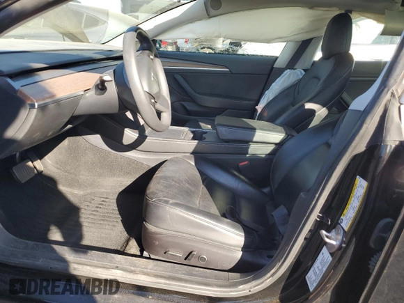 2021 Tesla Model 3 Standard Range Plus with VIN 5YJ3E1EA3MF996701, listed as a Copart auction lot 47013195 with 34,177 mi miles and Salvage Title. Bid and sale history available at carsss.com. Image 7.