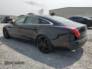 2014 Jaguar XJ with VIN SAJWA2GZ7E8V60213, listed as a Copart auction lot 53382454 with 88,870 mi miles and Salvage Title. Bid and sale history available at carsss.com. Image 2.