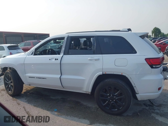 2018 Jeep Grand Cherokee Laredo with VIN 1C4RJFAGXJC121900, listed as a IAAI auction lot 42429505 with 72,351 mi miles and . Bid and sale history available at DreamBid. Image 15.