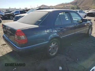 1996 Mercedes-Benz C with VIN WDBHA28E5TF406948, listed as a Copart auction lot 80234944 with 239,256 mi miles and Salvage Title. Bid and sale history available at carsss.com. Image 3.