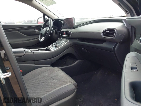 2023 Hyundai Santa Fe SEL with VIN 5NMS24AJ7PH563090, listed as a IAAI auction lot 42218343 with 52,076 mi miles and . Bid and sale history available at DreamBid. Image 5.