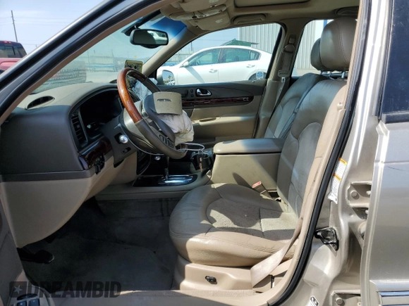 2002 Lincoln Continental with VIN 1LNHM97V22Y699435, listed as a Copart auction lot 66672354 with 216,764 mi miles and Salvage Title. Bid and sale history available at carsss.com. Image 7.