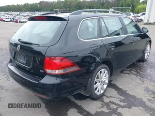 2014 Volkswagen Jetta TDI w/Sunroof & Nav with VIN 3VWPL7AJ9EM609661, listed as a IAAI auction lot 42600438 with 105,958 mi miles and . Bid and sale history available at DreamBid. Image 4.