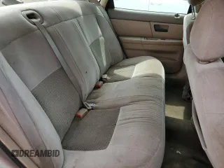 2004 Ford Taurus SE z VIN 1FAFP53U44A122559, wystawiony jako Copart lot #55606595 z przebiegiem Nie podano mil oraz Szkoda całkowita • Salvage title. Historia ofert i sprzedaży dostępna na DreamBid. Obrazek 10.