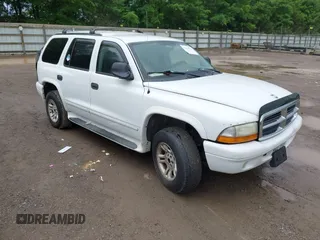 2003 Dodge Durango SLT z VIN 1D4HS48N63F597227, wystawiony jako IAAI lot #42376919 z przebiegiem 291 371 mil mil oraz . Historia ofert i sprzedaży dostępna na DreamBid. Obrazek 1.
