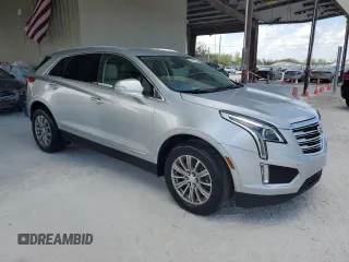 2019 Cadillac XT5 Luxury FWD with VIN 1GYKNCRSXKZ167345, listed as a Copart auction lot 54727105 with Not Provided miles and Salvage Title. Bid and sale history available at DreamBid. Image 4.