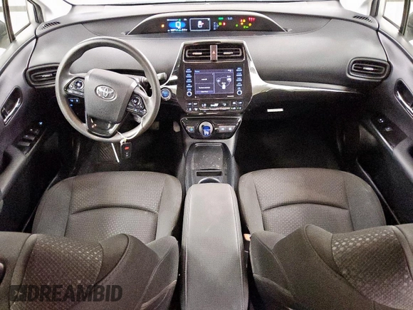 2021 Toyota Prius L Eco z VIN JTDKAMFU0M3140335, wystawiony jako Copart lot #61955845 z przebiegiem 96 071 mil mil oraz Czysty tytuł • Clean title. Historia ofert i sprzedaży dostępna na DreamBid. Obrazek 8.