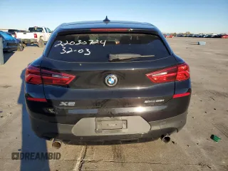 2020 BMW X2 sDrive28i with VIN WBXYH9C09L5P36280, listed as a Copart auction lot 69008942 with 57,925 mi miles. Bid and sale history available at carsss.com. Image 6.