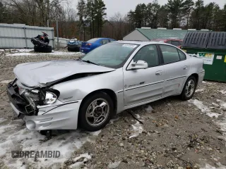 2001 Pontiac Grand Am GT1 with VIN 1G2NV52E31C236580, listed as a Copart auction lot 83085894 with 114,381 mi miles and Salvage Title. Bid and sale history available at carsss.com. Image 1.