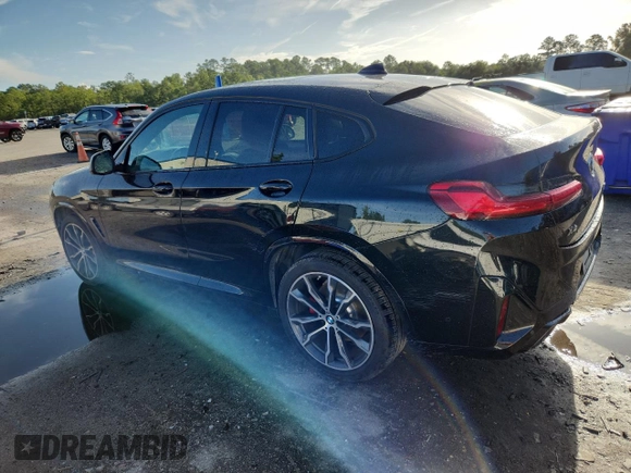 2021 BMW X4 M40i with VIN 5UX2V5C05M9F68427, listed as a Copart auction lot 64941095 with 50,208 mi miles and Salvage title. Bid and sale history available at DreamBid. Image 2.