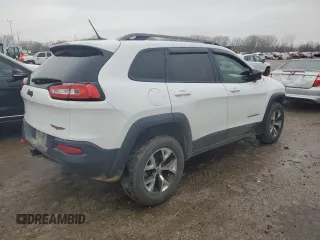 2015 Jeep Cherokee Trailhawk z VIN 1C4PJMBS9FW698857, wystawiony jako Copart lot #86572504 z przebiegiem 143 919 mil mil oraz Czysty tytuł • Clean title. Historia ofert i sprzedaży dostępna na DreamBid. Obrazek 3.