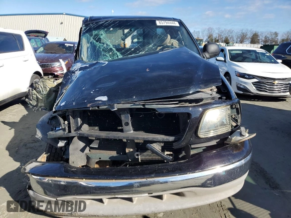 2002 Ford F-150 XL with VIN 1FTRX17W52NB83825, listed as a Copart auction lot 85794444 with 0 mi miles and Salvage Title. Bid and sale history available at carsss.com. Image 5.