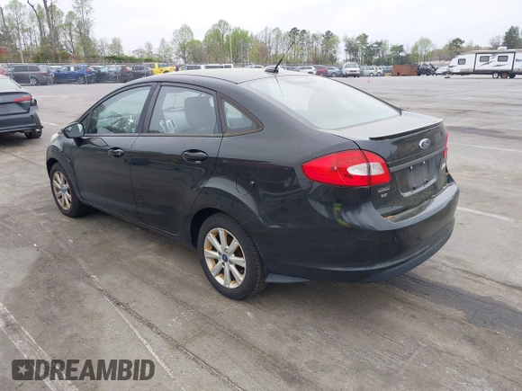 2011 Ford Fiesta SE with VIN 3FADP4BJ5BM221349, listed as a IAAI auction lot 41948737 with 216,540 mi miles. Bid and sale history available at carsss.com. Image 3.
