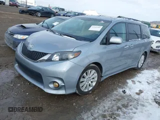 2013 Toyota Sienna SE with VIN 5TDXK3DC0DS354540, listed as a IAAI auction lot 41445501 with 238,814 mi miles and . Bid and sale history available at DreamBid. Image 2.