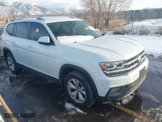 2018 Volkswagen Atlas 3.6L V6 SE with VIN 1V2LR2CA7JC582308, listed as a IAAI auction lot 41079168 with 57,369 mi miles. Bid and sale history available at carsss.com. Image 1.