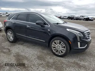 2017 Cadillac XT5 Premium Luxury FWD with VIN 1GYKNCRS3HZ151478, listed as a Copart auction lot 51488265 with 105,275 mi miles and Salvage title. Bid and sale history available at DreamBid. Image 4.