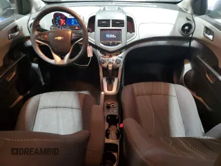 2014 Chevrolet Sonic LT with VIN 1G1JC5SH4E4239958, listed as a Copart auction lot 46082295 with 128,275 mi miles and Salvage Title. Bid and sale history available at DreamBid. Image 8.