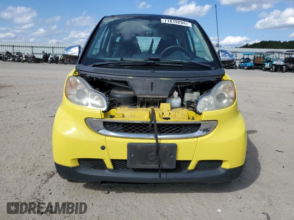 2010 Smart fortwo Pure z VIN WMEEJ3BAXAK371054, wystawiony jako Copart lot #71819294 z przebiegiem 103 177 mil mil oraz Szkoda całkowita • Salvage title. Historia ofert i sprzedaży dostępna na DreamBid. Obrazek 5.