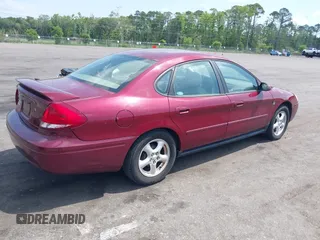 2004 Ford Taurus SES with VIN 1FAFP55S84A141126, listed as a IAAI auction lot 42200307 with 122,195 mi miles and . Bid and sale history available at DreamBid. Image 4.