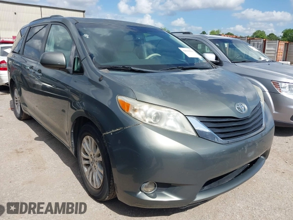 2014 Toyota Sienna XLE with VIN 5TDYK3DC2ES448876, listed as a IAAI auction lot 42519351 with 154,601 mi miles and . Bid and sale history available at DreamBid. Image 1.