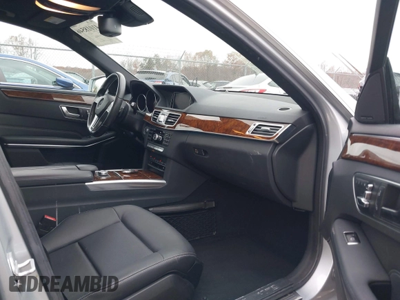 2014 Mercedes-Benz E 350 Luxury with VIN WDDHF8JB0EB075945, listed as a IAAI auction lot 41018546 with 66,678 mi miles and . Bid and sale history available at DreamBid. Image 5.