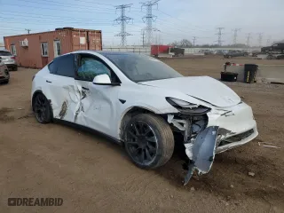 2022 Tesla Model Y Long Range with VIN 7SAYGAEE1NF540574, listed as a Copart auction lot 49001125 with 40,806 mi miles and Salvage Title. Bid and sale history available at carsss.com. Image 4.