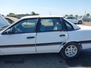 1988 Ford Tempo z VIN 1FAPP36X6JK132773, wystawiony jako IAAI lot #42146576 z przebiegiem 80 452 mil mil oraz . Historia ofert i sprzedaży dostępna na DreamBid. Obrazek 6.