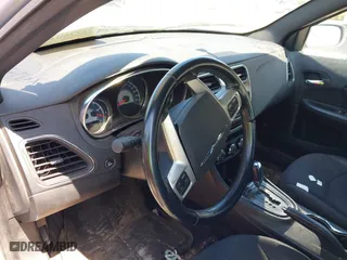 2013 Chrysler 200 Touring with VIN 1C3CCBBB6DN696200, listed as a IAAI auction lot 41994028 with 177,610 mi miles. Bid and sale history available at carsss.com. Image 13.