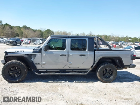 2021 Jeep Gladiator Freedom with VIN 1C6HJTAG3ML540967, listed as a IAAI auction lot 41883858 with 92,287 mi miles and . Bid and sale history available at DreamBid. Image 14.