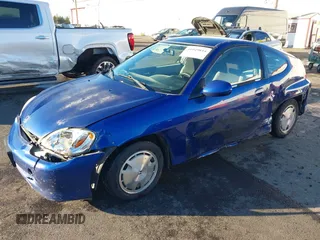 2002 Honda Insight z VIN JHMZE14722T000006, wystawiony jako IAAI lot #41049894 z przebiegiem 185 989 mil mil oraz . Historia ofert i sprzedaży dostępna na DreamBid. Obrazek 2.