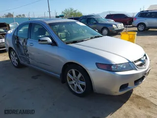 2004 Acura TSX w/Navigation with VIN JH4CL96944C002982, listed as a IAAI auction lot 41855710 with 165,129 mi miles. Bid and sale history available at carsss.com. Image 1.
