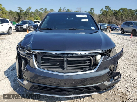 2022 Cadillac XT6 Premium Luxury with VIN 1GYKPCRS1NZ104567, listed as a Copart auction lot 47173005 with 54,541 mi miles and Clean Title. Bid and sale history available at carsss.com. Image 5.