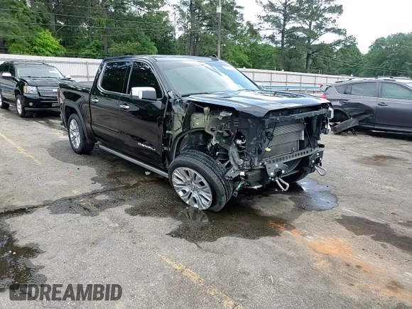 2021 GMC Sierra 1500 Denali z VIN 3GTU9FEL4MG299569, wystawiony jako Copart lot #53911385 z przebiegiem 95 068 mil mil oraz Szkoda całkowita • Salvage title. Historia ofert i sprzedaży dostępna na DreamBid. Obrazek 14.