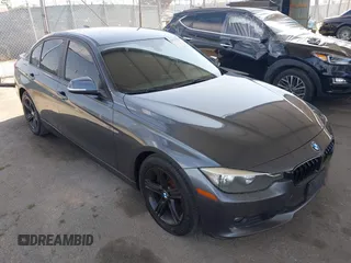 2015 BMW 3 Series 328i with VIN WBA3C1C56FK120073, listed as a IAAI auction lot 42571784 with 162,400 mi miles and . Bid and sale history available at DreamBid. Image 1.