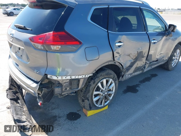 2017 Nissan Rogue SV with VIN KNMAT2MT9HP581822, listed as a IAAI auction lot 42140794 with 74,261 mi miles. Bid and sale history available at carsss.com. Image 6.