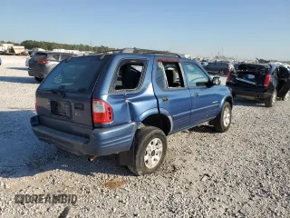 2002 Isuzu Rodeo S with VIN 4S2CK58W124307433, listed as a Copart auction lot 75447074 with 129,163 mi miles and Salvage title. Bid and sale history available at DreamBid. Image 3.