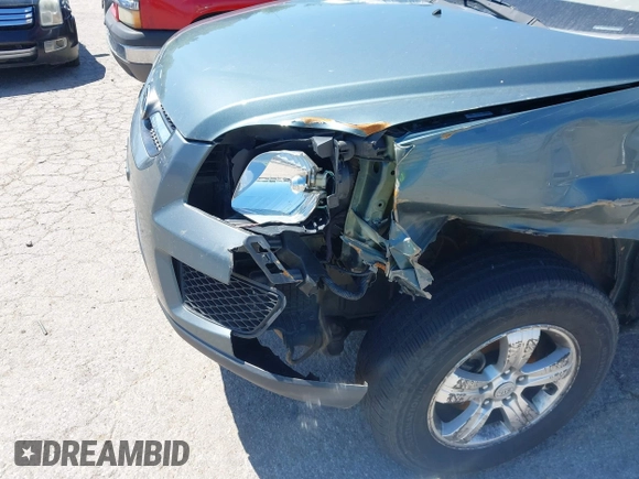 2009 Kia Sportage LX with VIN KNDJF724497602223, listed as a IAAI auction lot 42085415 with 91,105 mi miles. Bid and sale history available at carsss.com. Image 6.