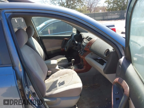 2008 Toyota RAV4 with VIN JTMZK33VX85016781, listed as a IAAI auction lot 41662569 with 217,333 mi miles. Bid and sale history available at carsss.com. Image 5.